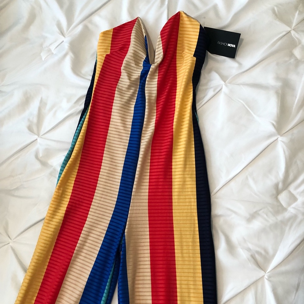 Multi colored jumpsuit with tags